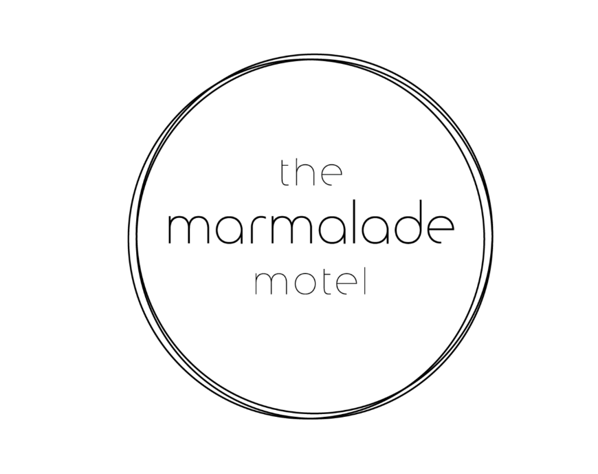 Logo of 'the marmalade motel' with a circular design on a white background